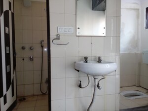 Bathroom in 1 BHK Apartment at Molarband – for Sale