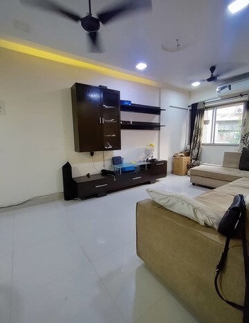 Living Room in 1 BHK Apartment at Hiranandani Gardens, Powai – for Rent