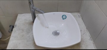Bathroom in 1 BHK Apartment at Bhartiya Nikoo Homes, Thanisandra Main Road – for Sale