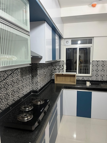 Kitchen in 2 BHK Apartment at Ashar Axis, Majiwada – for Rent