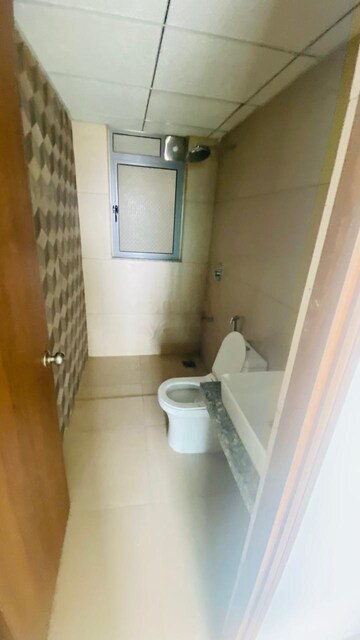 Bathroom in 2 BHK Apartment at Kalpataru Immensa, Kolshet Road – for Rent