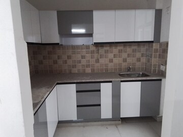 Kitchen in 2 BHK Apartment at Mahagun Mywoods, Sector 16c Greater Noida – for Rent