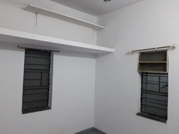 Bedroom in 1 BHK Apartment at Gangotree Prabhakar Smruti, Dahanukar Colony – for Rent