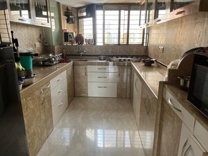 Kitchen in 2 BHK Apartment at Guru Mahima CHS, Sanpada – for Sale