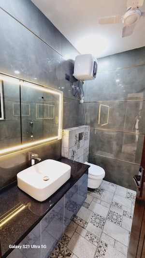 Bathroom in 4 BHK Builder Floor at Ansal API Esencia, Sector 67 – for Sale