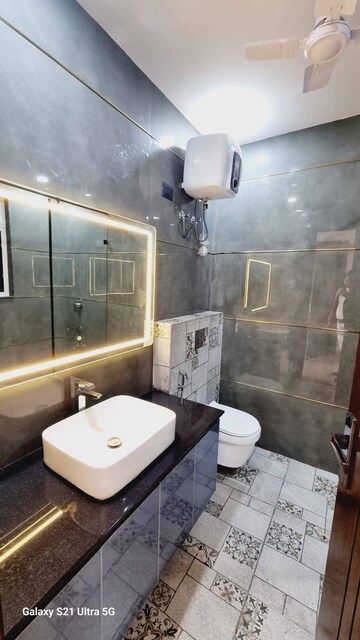 Bathroom in 4 BHK Builder Floor at Ansal API Esencia, Sector 67 – for Sale