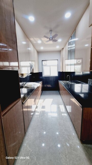 Kitchen in 4 BHK Builder Floor at Ansal API Esencia, Sector 67 – for Sale