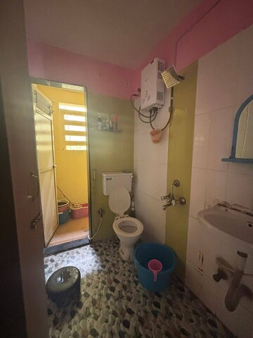 Bathroom in 2 BHK Apartment at Gurudev Heights, Kamothe – for Rent