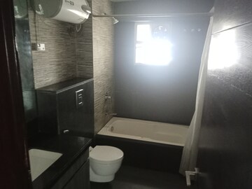 Bathroom in 4 BHK Apartment at Tilak Nagar – for Sale