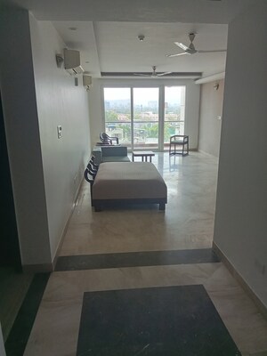 Living Room in 4 BHK Apartment at Tilak Nagar – for Sale