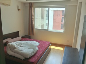 Bedroom in 4 BHK Apartment at Tilak Nagar – for Sale