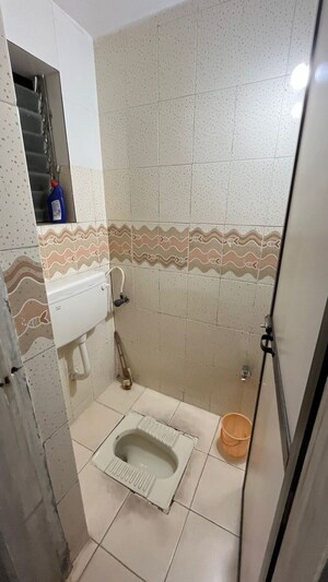 Bathroom in 1 BHK Apartment at Mahavir Bhakti CHS, Kopar Khairane – for Sale