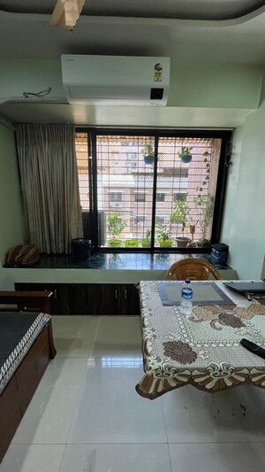 Living Room in 1 BHK Apartment at Mahavir Bhakti CHS, Kopar Khairane – for Sale
