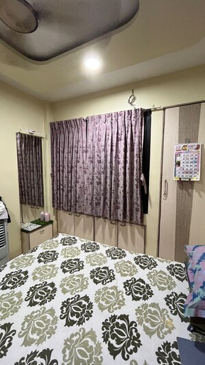 Bedroom in 1 BHK Apartment at Mahavir Bhakti CHS, Kopar Khairane – for Sale