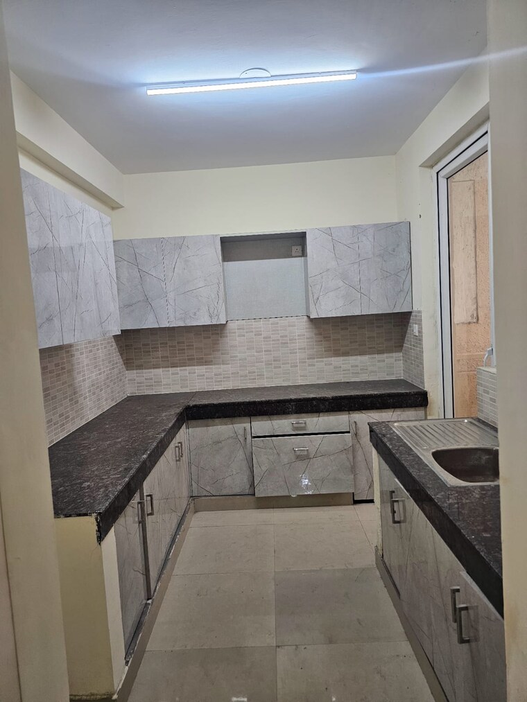 Kitchen, ansal-estella 3 Bedroom 1740 Sq.Ft. Apartment In Sector 103 Gurgaon 8723951