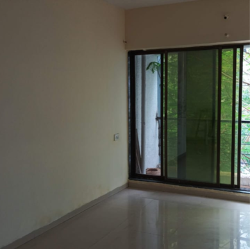 Room in 2 BHK Apartment at Gaurav Paradise, Kanakia Road – for Rent