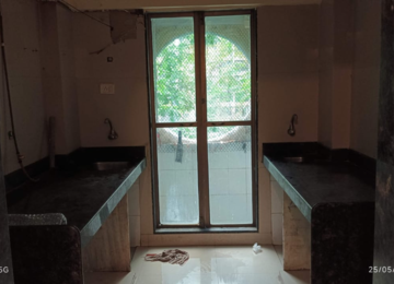 Room in 2 BHK Apartment at Gaurav Paradise, Kanakia Road – for Rent