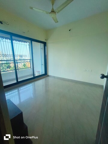 Room in 2 BHK Apartment at Tulsi Aura Mumbai, Ghansoli – for Rent