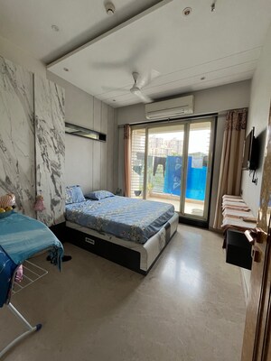 Bedroom in 3 BHK Apartment at Mohan Altezza, Wayle Nagar – for Sale