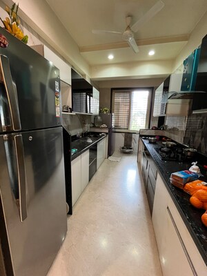 Kitchen in 3 BHK Apartment at Mohan Altezza, Wayle Nagar – for Sale