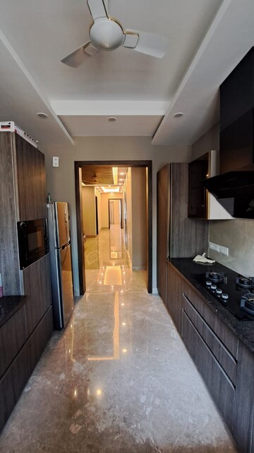 Kitchen in 4 BHK Builder Floor at Ansal Sushant Lok I, Sector 43 – for Rent