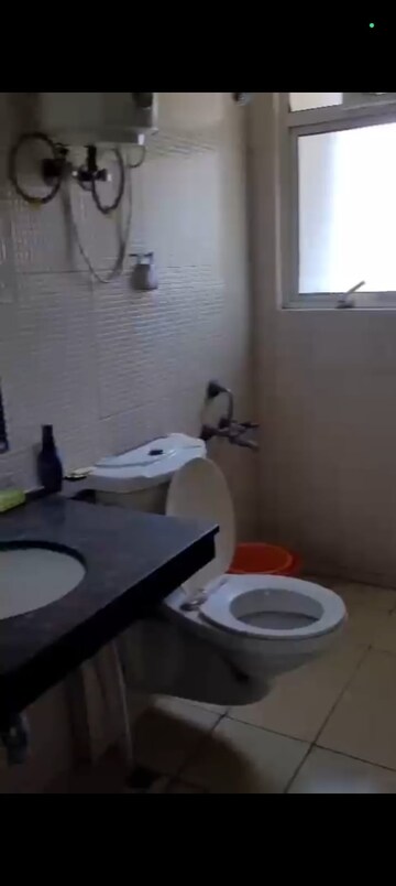 Bathroom in 3 BHK Apartment at Great Value Sharanam, Sector 107 – for Rent