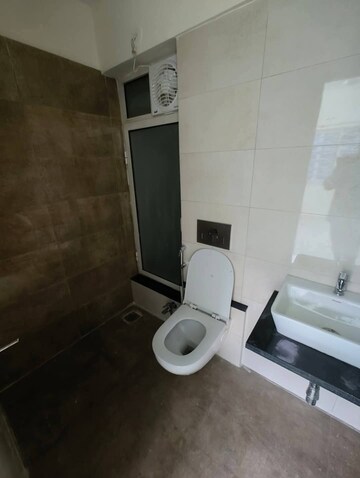 Bathroom in 1 BHK Apartment at Omkar Signet, Malad East – for Rent