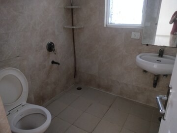 Bathroom in 4 BHK Apartment at Great Value Sharanam, Sector 107 – for Sale