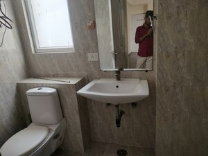 Bathroom in 4 BHK Apartment at Great Value Sharanam, Sector 107 – for Sale