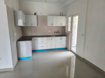 Kitchen in 3 BHK Apartment at Samridhi Luxuriya Avenue, Sector 150 – for Rent