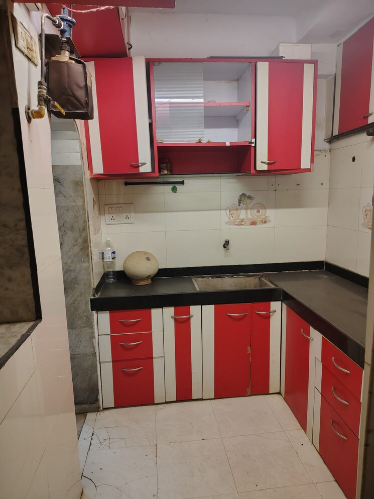 Kitchen, blue-bell-chs-oshiwara 1 Bedroom 550 Sq.Ft. Apartment In Oshiwara Mumbai 8724611