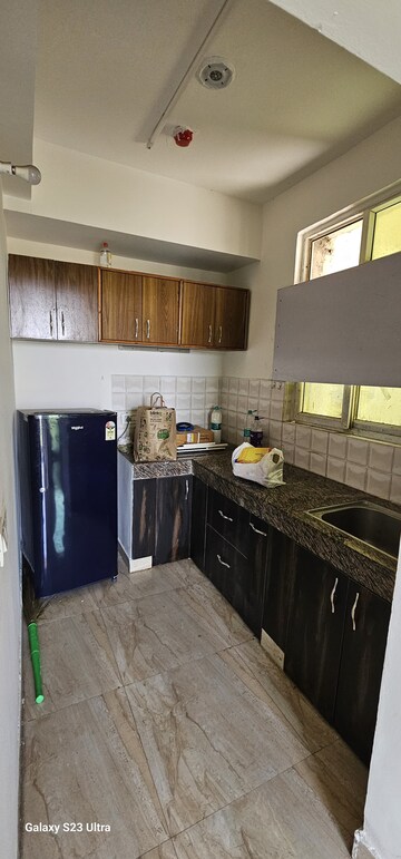 Kitchen in 2 BHK Apartment at Supertech Czar Suites, Omicron I Greater Noida – for Sale