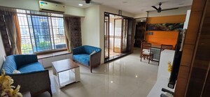 Living Room in 3 BHK Apartment at Shah & Chheda Mahavir Ornate, Kopar Khairane – for Sale