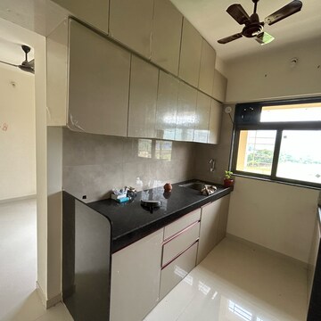 Kitchen in 2 BHK Apartment at KM Horizon Exotica, Anand Nagar – for Rent