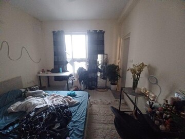 Living Room in 2 BHK Apartment at Godrej Aqua, International Airport Road – for Sale