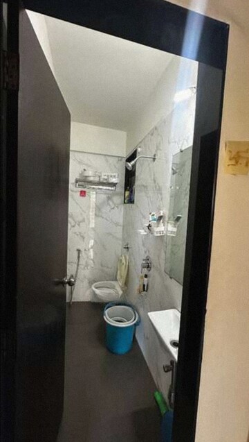 Bathroom in 1 BHK Apartment at Velocity Hill Spring, Ghodbunder Road – for Rent