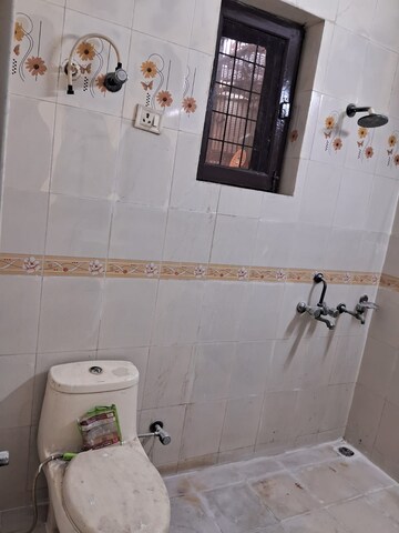 Bathroom in 4 BHK Builder Floor at Sector 105 – for Rent