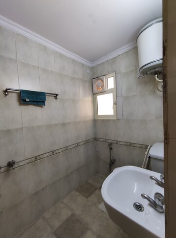Bathroom in 3 BHK Apartment at Vasant Kunj – for Rent