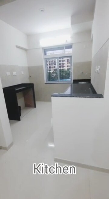 Kitchen in 1 BHK Apartment at Charms Global City, Ambernath East – for Sale
