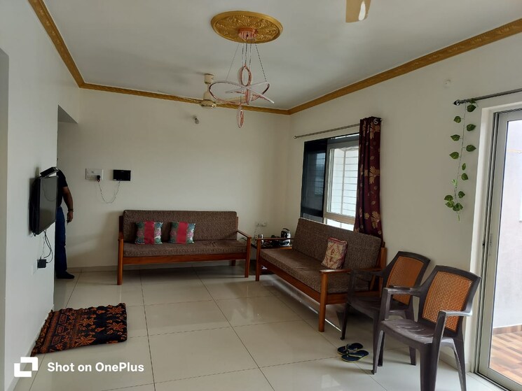 Living Room, kolte-patil-24k-stargaze 2 Bedroom 1100 Sq.Ft. Apartment In Bavdhan Pune 8725492