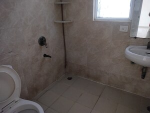 Bathroom in 3 BHK Apartment at Great Value Sharanam, Sector 107 – for Sale