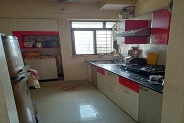 Kitchen in 1 BHK Apartment at Puranik Hometown, Ghodbunder Road – for Sale