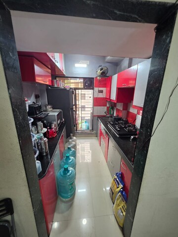 Kitchen in 2 BHK Apartment at Ostwal Orchid, Mira Road East – for Sale