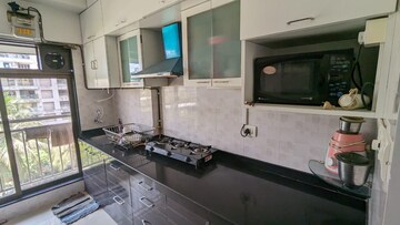 Kitchen in 3 BHK Apartment at Bajaj Enchante Panchsheel CHS, Andheri West – for Rent