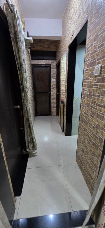 Building Lobby in 2 BHK Apartment at Sugandh CHS, Kopar Khairane – for Rent