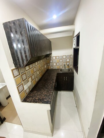 Kitchen in 3 BHK Apartment at Naupada – for Sale
