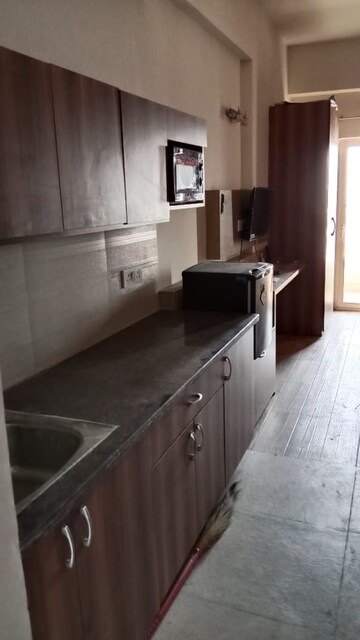 Kitchen in 2 BHK Apartment at Panchsheel Greens II, Sector 16 Greater Noida – for Rent