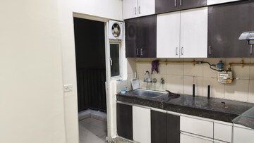 Kitchen in 3 BHK Apartment at Ajnara Le Garden, Sector 16b Greater Noida – for Rent