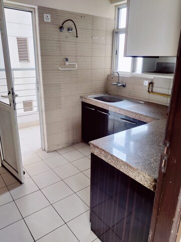 Kitchen in 2 BHK Apartment at 3C Lotus Boulevard, Sector 100 – for Rent