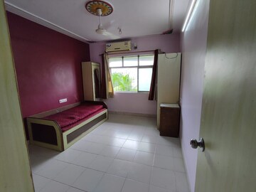 Bedroom in 1 BHK Apartment at Mandakini CHS, Dahisar East – for Rent